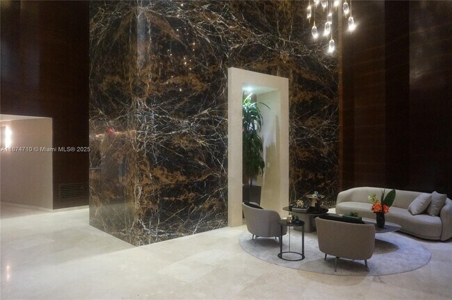 Building Photo - 15811 Collins Ave