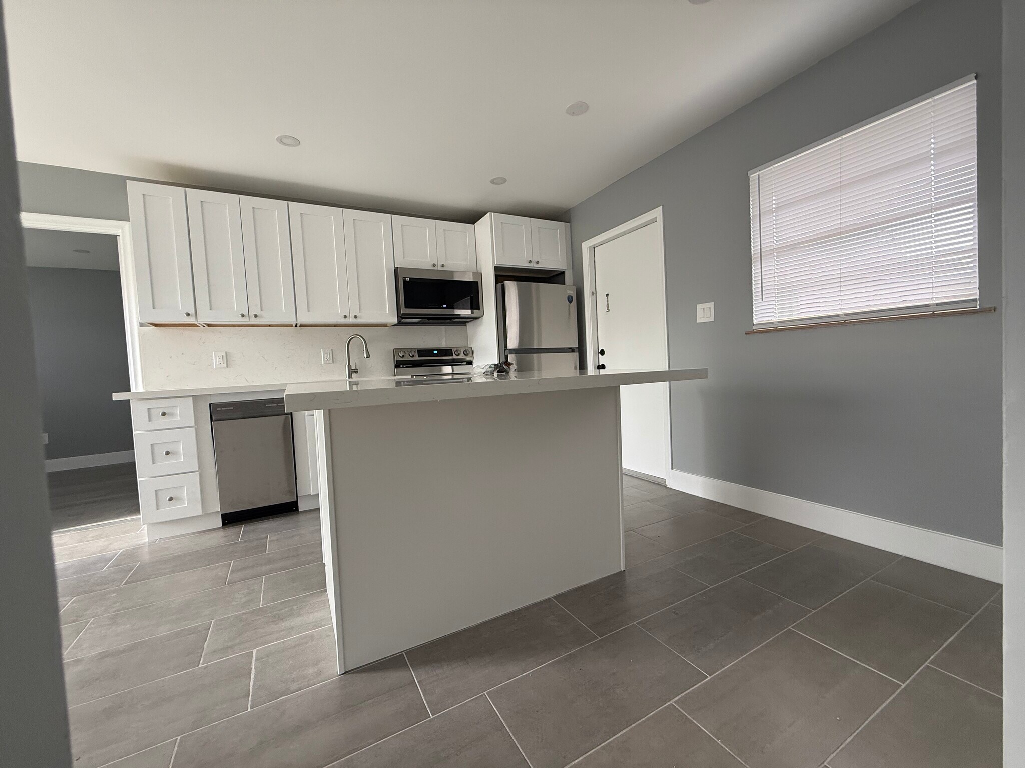 New Kitchen with all new appliances with dishwasher and microwave - 1404 NW 6th Ave