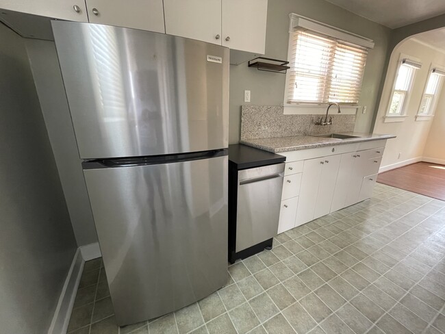 Other end of kitchen near back door - 3534 Helms Ave