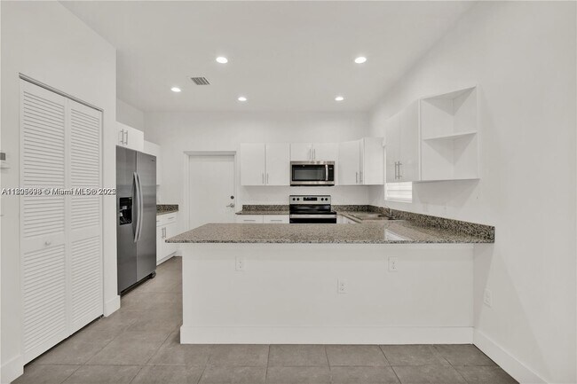 Building Photo - 6323 NW 1st Pl