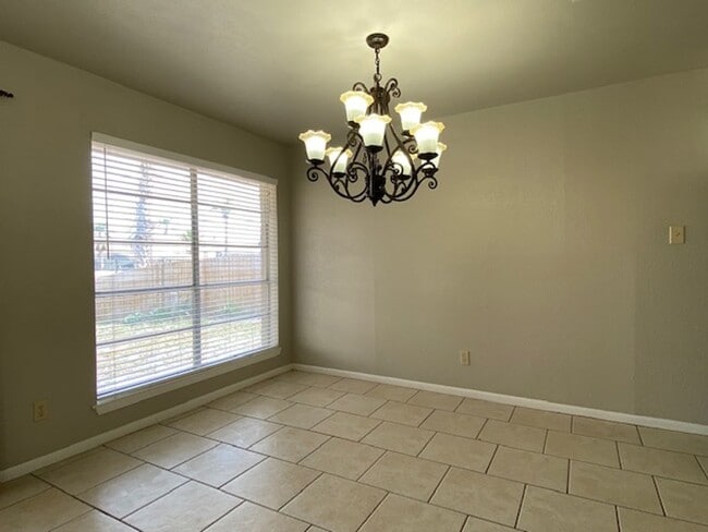 Building Photo - WATERFRONT HOME W/ FENCED YARD