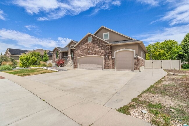 Building Photo - Spacious Syracuse Home with Covered Deck, Loft & Oversized 3-Car Garage