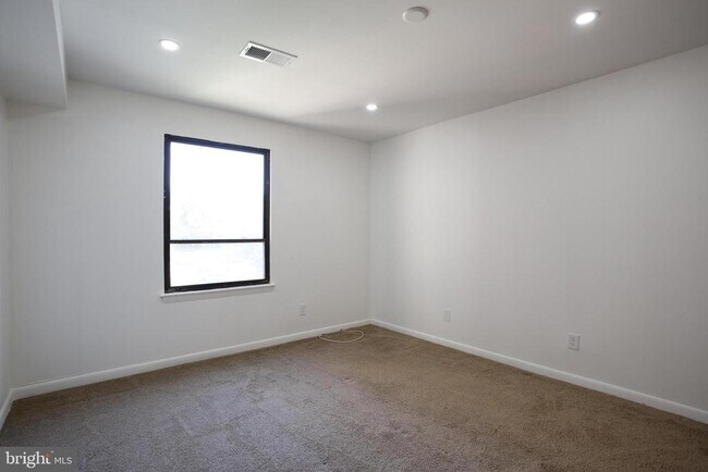 Building Photo - 6317 Park Heights Ave