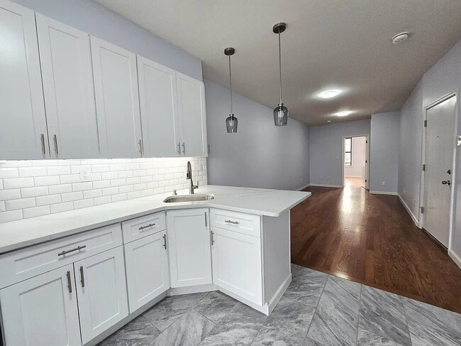 Building Photo - sunny, renovated, rent-stabilized one-bedroom apartment