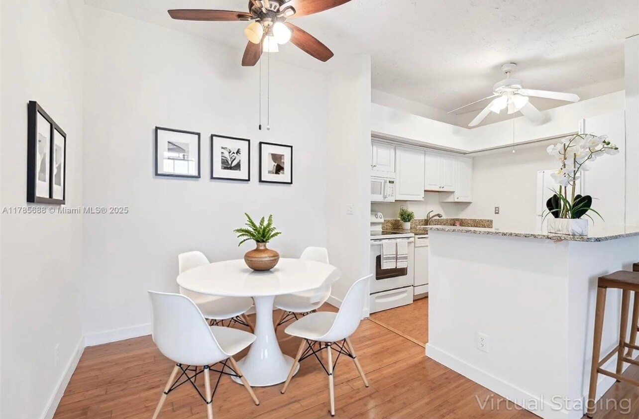 View from Hallway toward Kitchen and Dining - 15492 Lakes of Delray Blvd