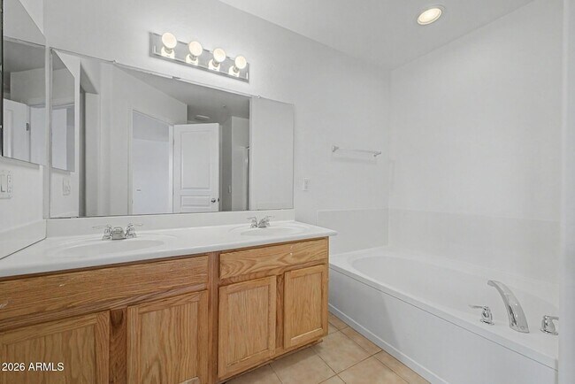 Building Photo - 8777 W Dahlia Dr
