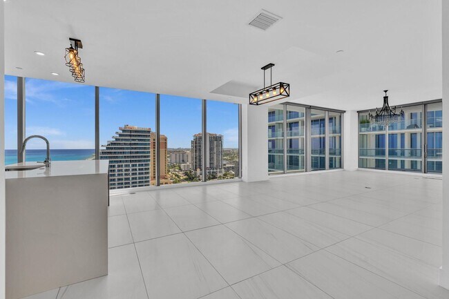 Building Photo - Stunning High-Rise Condo with Ocean Views | Prime Beach Location