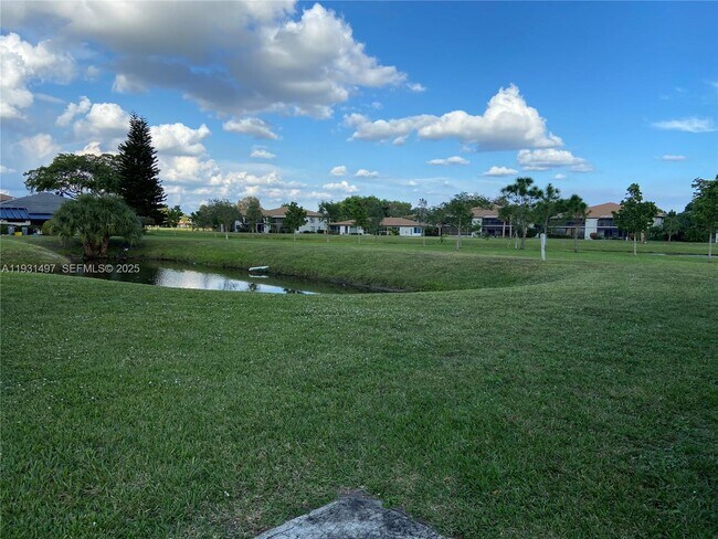 Building Photo - 13283 Pineapple Palm Ct