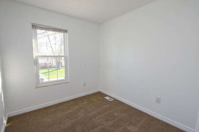 Building Photo - 1080 Arapaho Ave