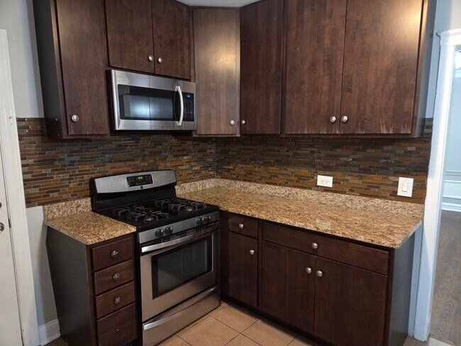 Building Photo - 5653 N Spaulding Ave