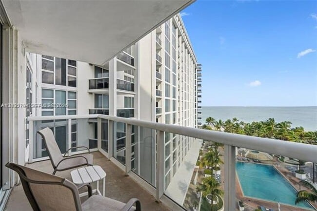 Building Photo - 10275 Collins Ave