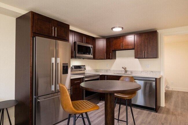 Building Photo - Ballard Gem! Updated Apartment w/ Parking, Bright Interiors & Steps to Dining + Parks