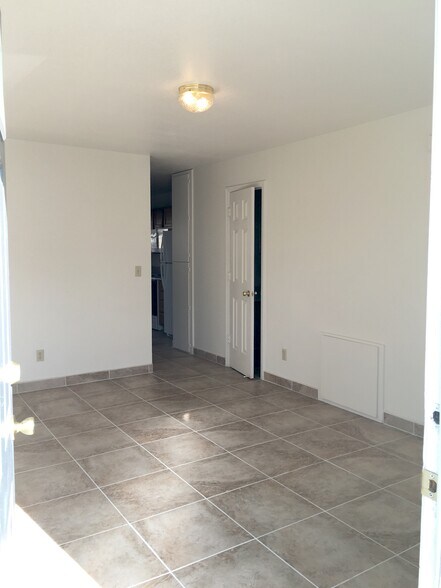 Tile floor downstairs - 3129 Airport Rd