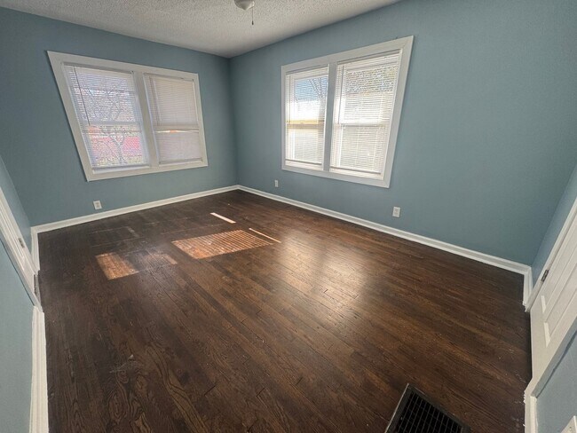 Building Photo - Charming 3BR 2BA Home w/ Fenced Yard + Covered Porch in KC