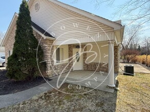 Building Photo - "Charming 2-Bed Condo with Fireplace & Scenic Views on Fox Cove Dr, Perrysburg!"