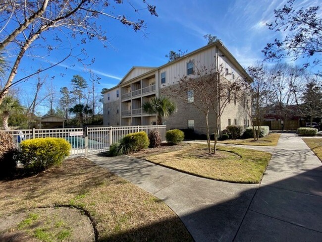 Building Photo - Welcome to this stunning 1st floor condo l...