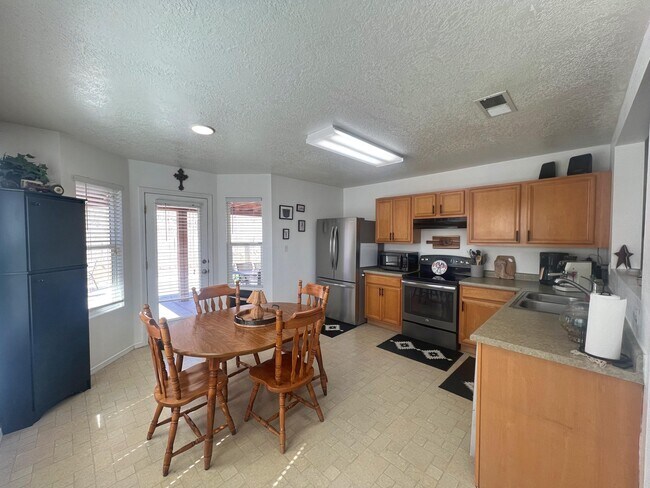 Building Photo - 6148 Malpais Park Ave NW