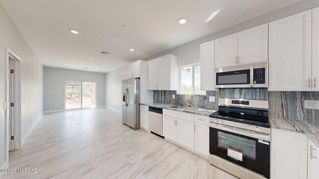 Building Photo - 7095 W Los Reales Rd