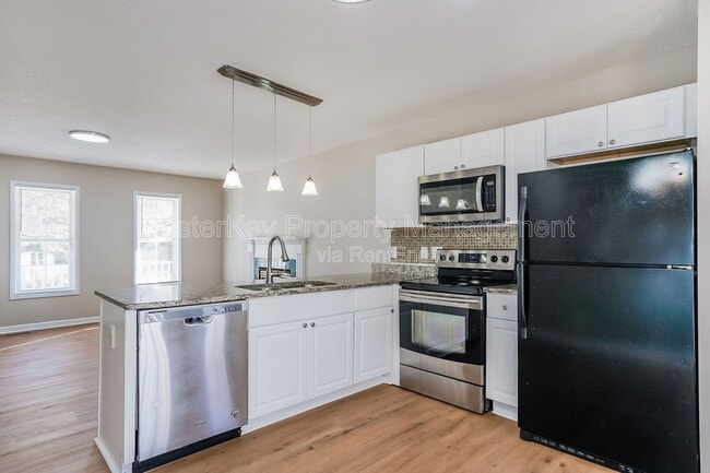 Building Photo - 5701 Woof Pl