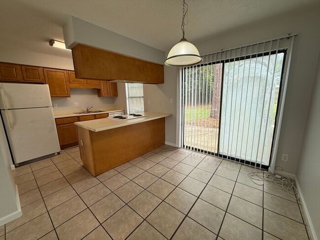 Building Photo - Gulf Breeze - Villa Woods - 2 bedroom, 1.5 bathroom
