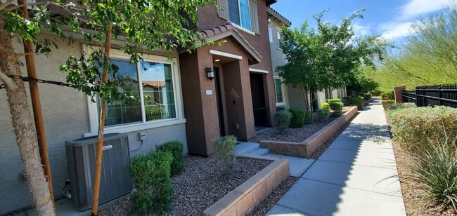 Building Photo - Beautiful townhome features a bright, open-concept layout