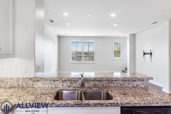 Building Photo - Modern Tri-Level Townhome with Office, 2-Car Garage & Prime Anaheim Location!