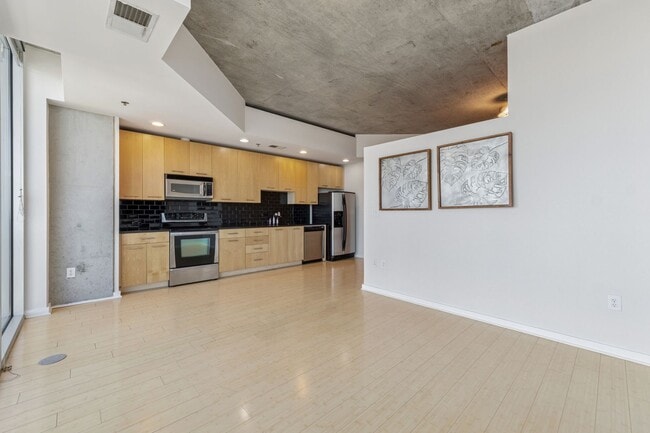 Building Photo - Sought After Realm Residences!