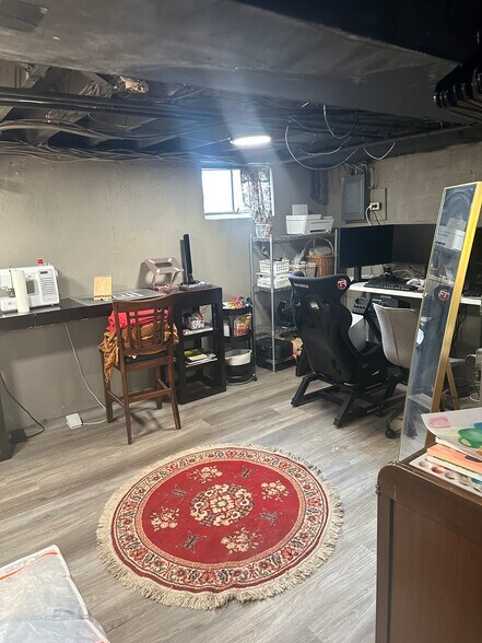 Basement, vinyl floor often used as office or tv room. - 189 Newman St