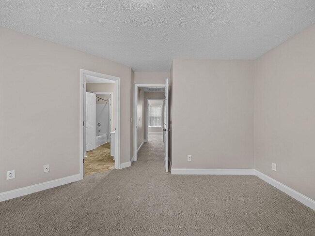 Building Photo - Freshly Renovated 2 BR, 2.5 BA Townhome Ce...