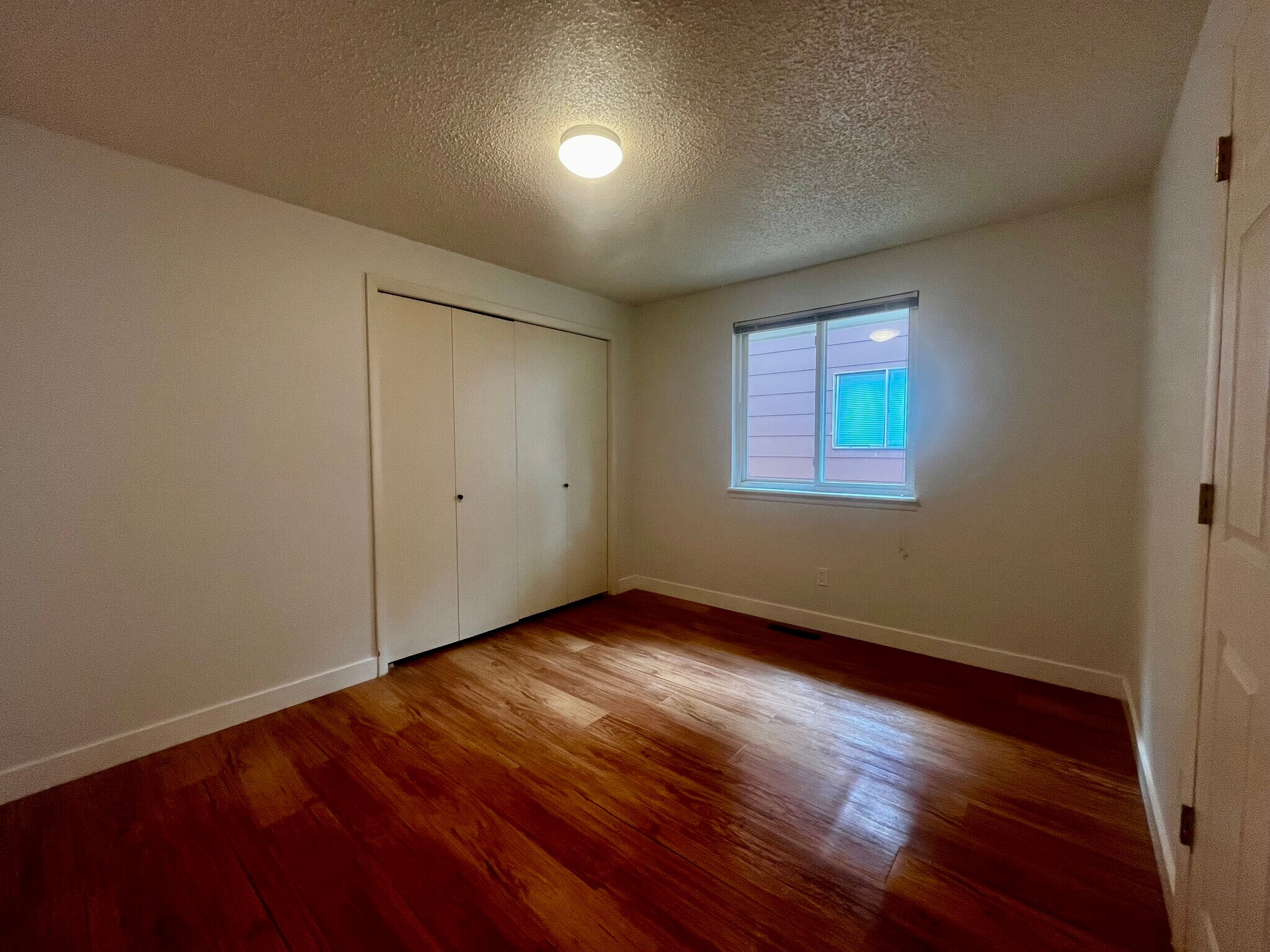 Second Bedroom with access to bathroom - 216 E Saint Clair Ave