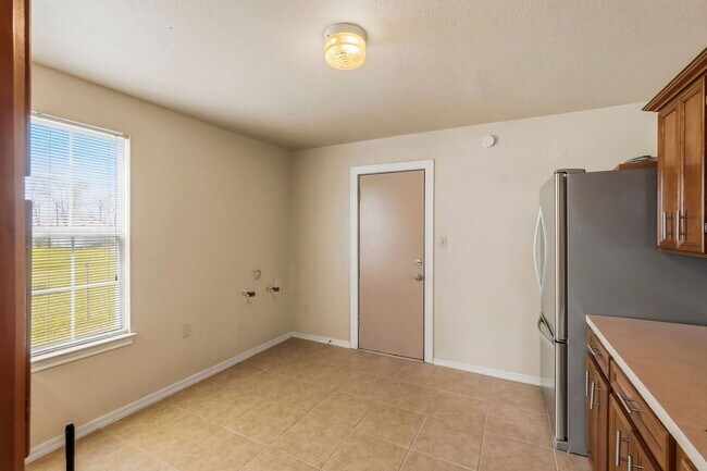 Building Photo - 7215 Apache St