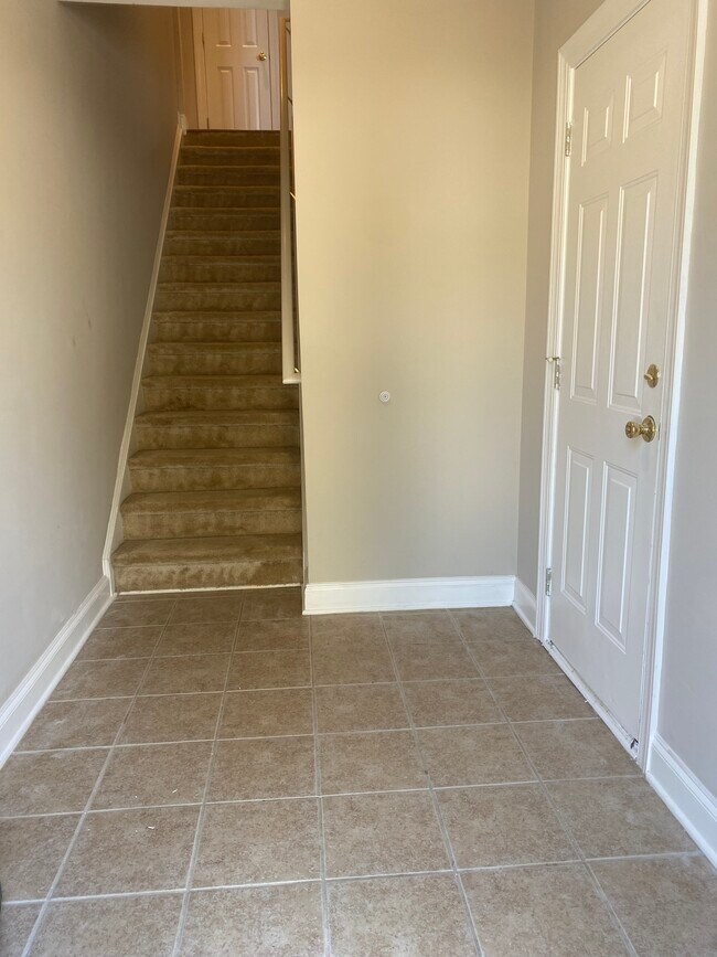 This is the entry to the home. A great for space for coats and shoes. - 137 High Ridge Rd