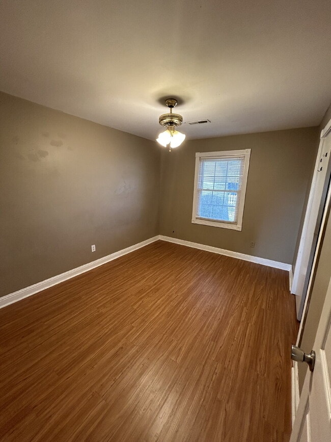 Building Photo - "Charming 4-Bedroom Home in Jonesboro with Cozy Fireplace & Gleaming Hardwood Floors!"