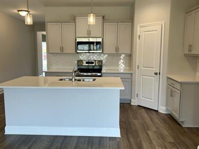 Building Photo - Relax & Unwind in This Peaceful 4 Bedroom ...
