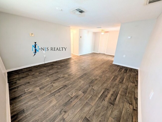 Building Photo - JUTS REDUCED!!!   3/1.5/1 1113 Sq. Ft. with UPDATED bathrooms and kitchen with GRANITE, LARGE bac...