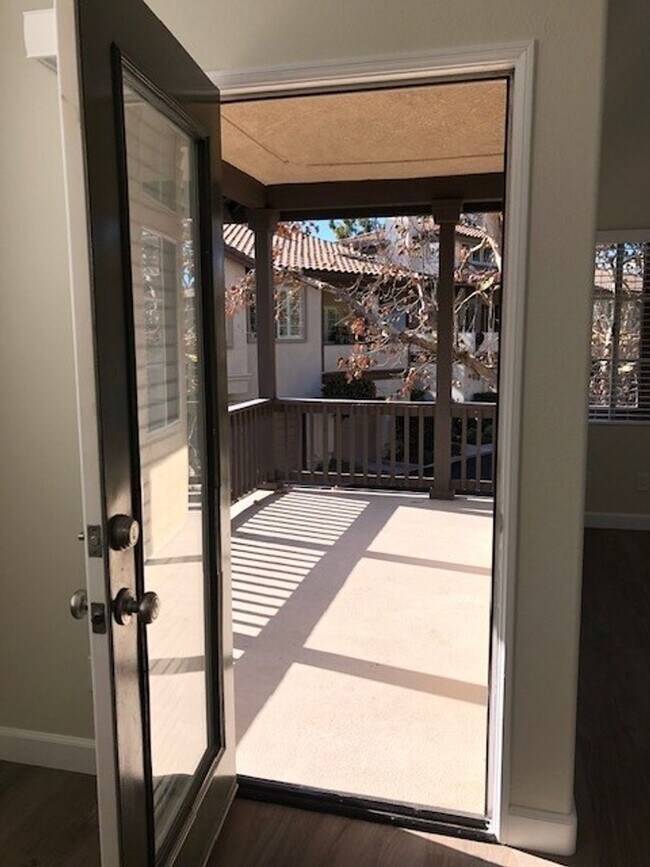 Building Photo - PICTURE PERFECT 2 BR/2 BATH PLUS LOFT END UNIT CONDO WITH DIRECT ACCESS 2 CAR GARAGE