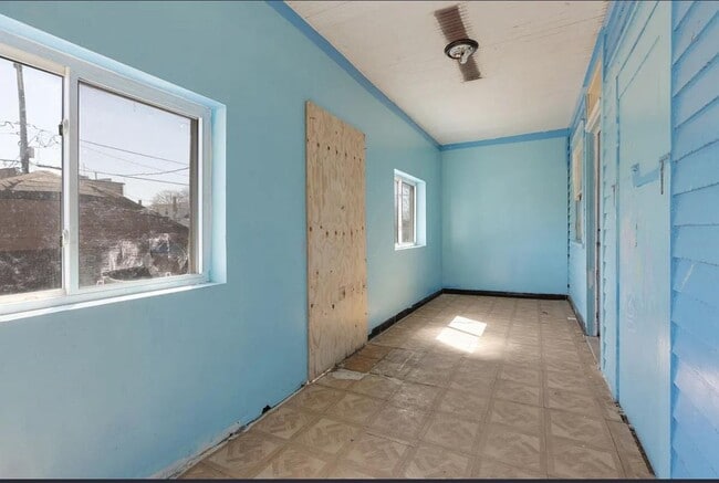Building Photo - 1301 W 71st Pl