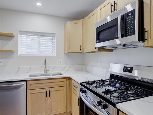 Building Photo - Cozy 2-Bedroom Home with Community Pool & Covered Parking