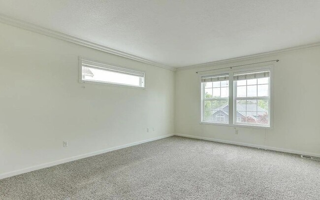 Building Photo - Spacious Four-Bedroom Home with Gourmet Kitchen, Multiple Living Areas, Loft, and Beautifully Lan...