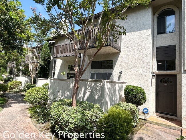 Building Photo - Welcome to this stunning ***unfurnished*** tri-level condo in the desirable Casitas de la Costa c...