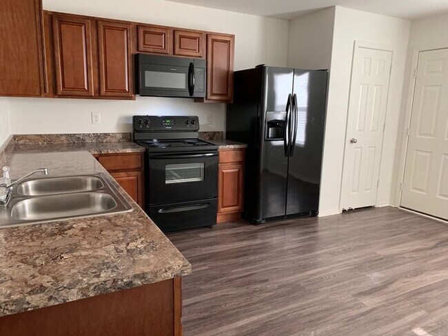 Building Photo - FOUR BEDROOM | TWO BATHROOM
