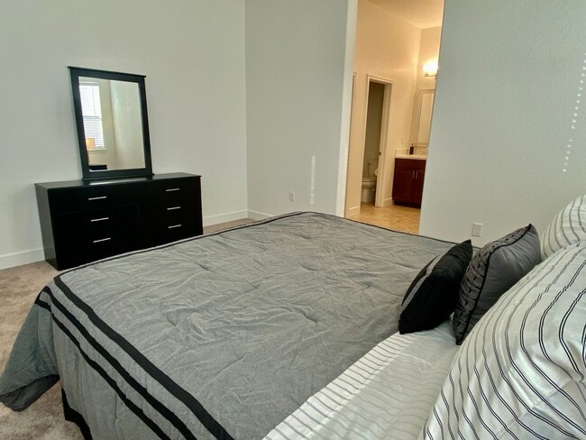 Building Photo - FULLY FURNISHED - ALMOST NEW 4 BED, 2.5 BATHS, 2 CAR GARAGE, 1 STORY IN NORTH LAKE COMMUNITY, NOR...