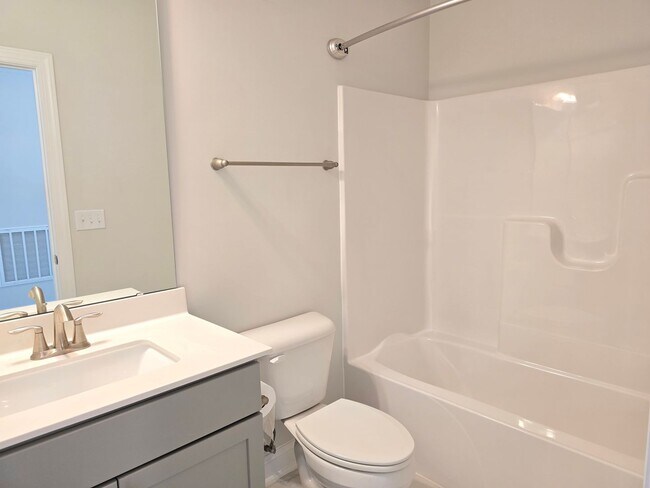 Building Photo - 4 spacious bedrooms and 3 full bathrooms along with guest suite. 1st floor primary and secondary ...