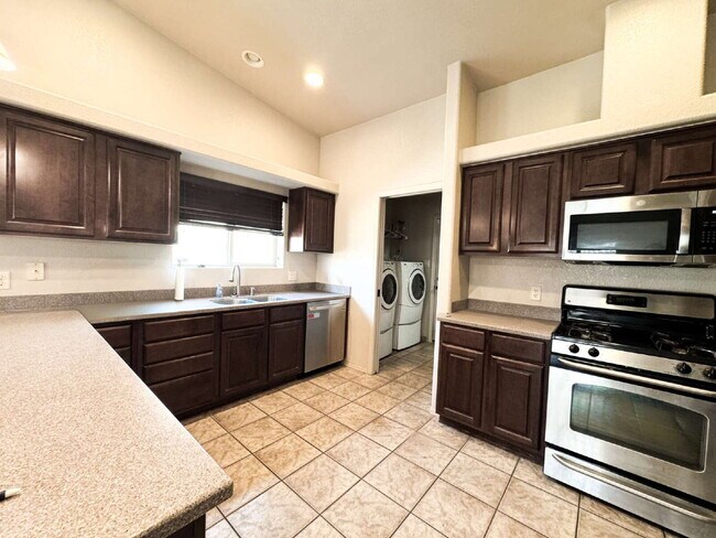 Building Photo - "Spacious 4-Bedroom, 2-Bathroom SOLAR Home in Mesa del Sol!"