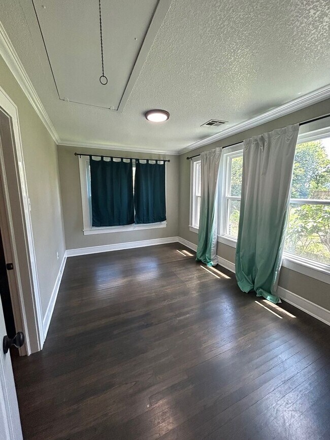 Building Photo - Spacious Corner Lot Charm