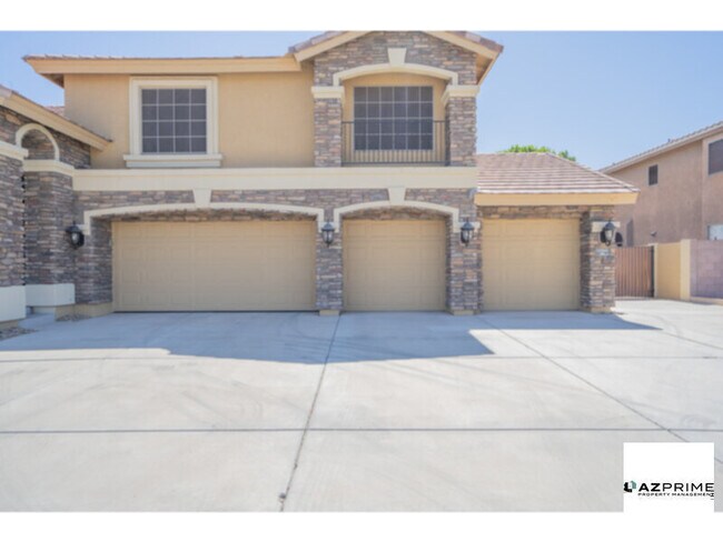Building Photo - Magnificent 5/3.5 Litchfield Park Home - L...
