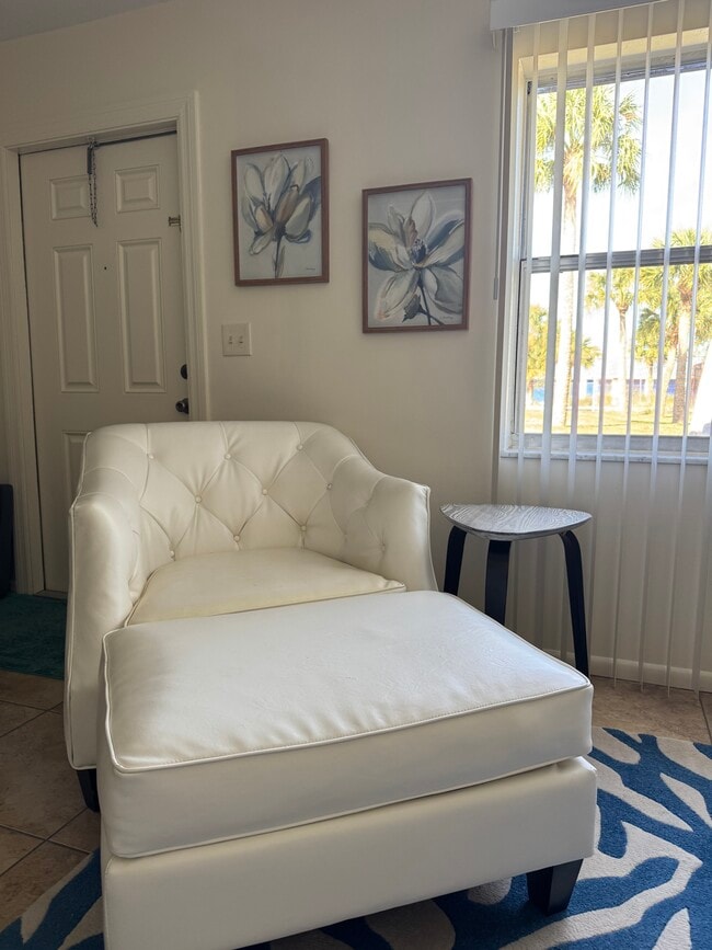 Living room chair & ottoman - 506 Quincy Ave