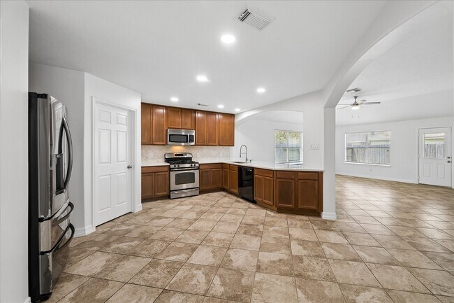 Building Photo - 8310 Hardy Elm St