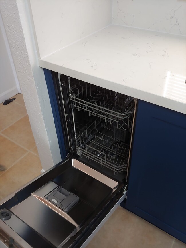 New dishwasher - 6130 W 21st Ct