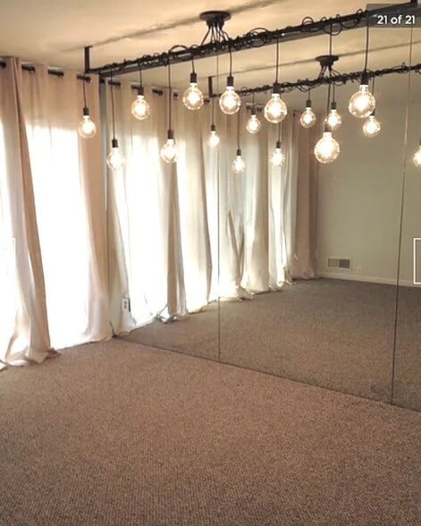 Livingroom is a pale gray and white trim - 77 Atterbury Blvd